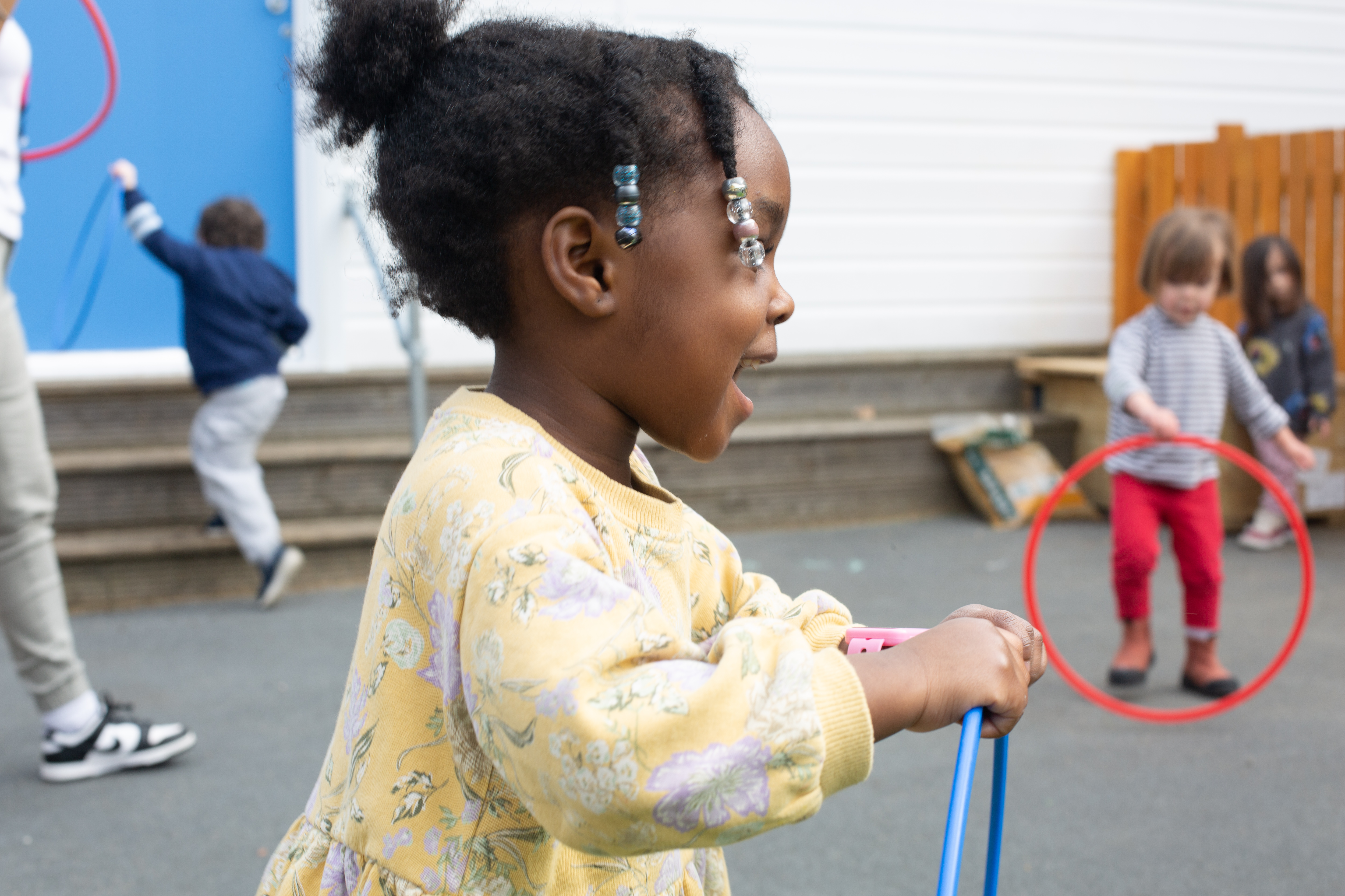 child with hoop