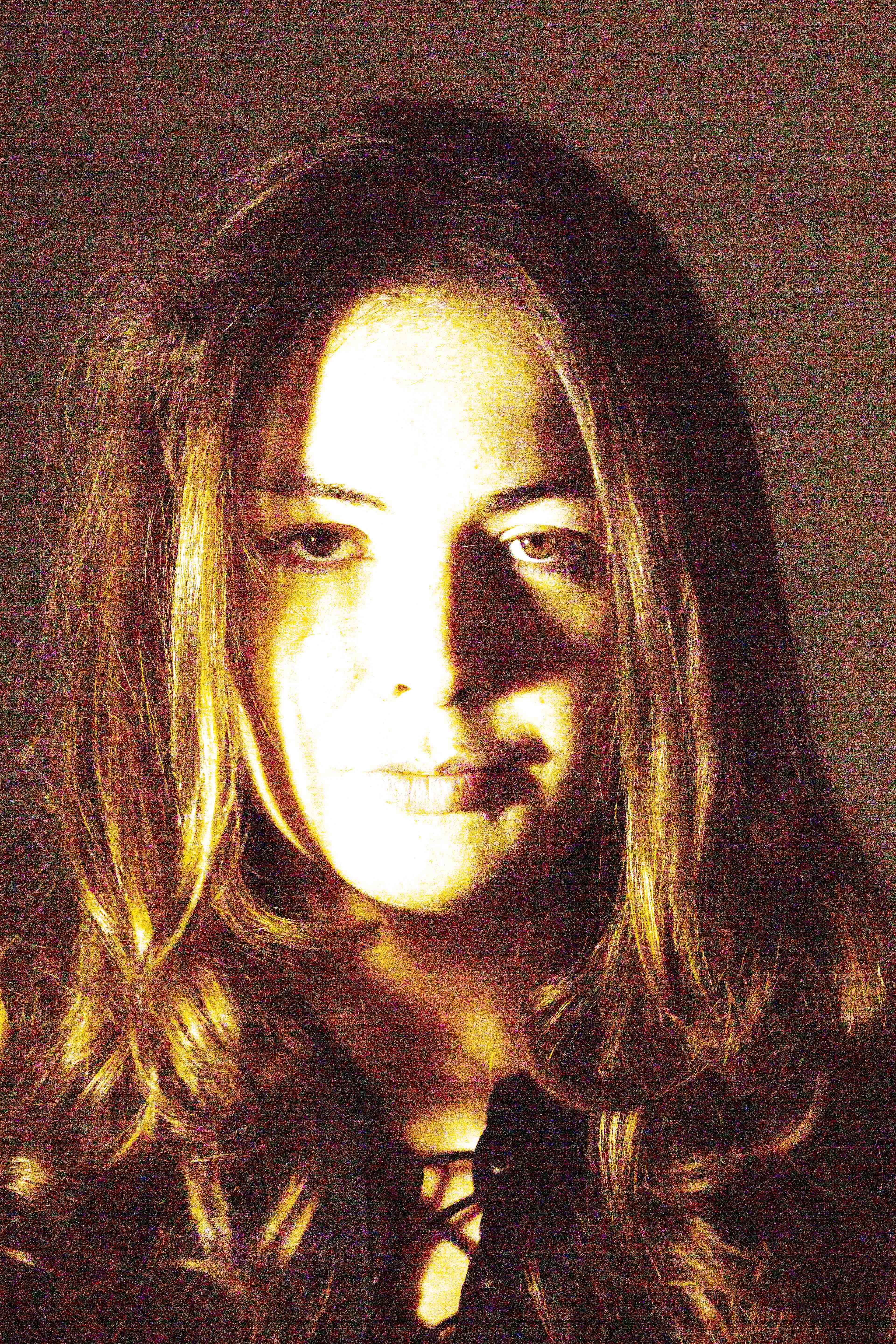 grainy self portrait with nice curly blow dry