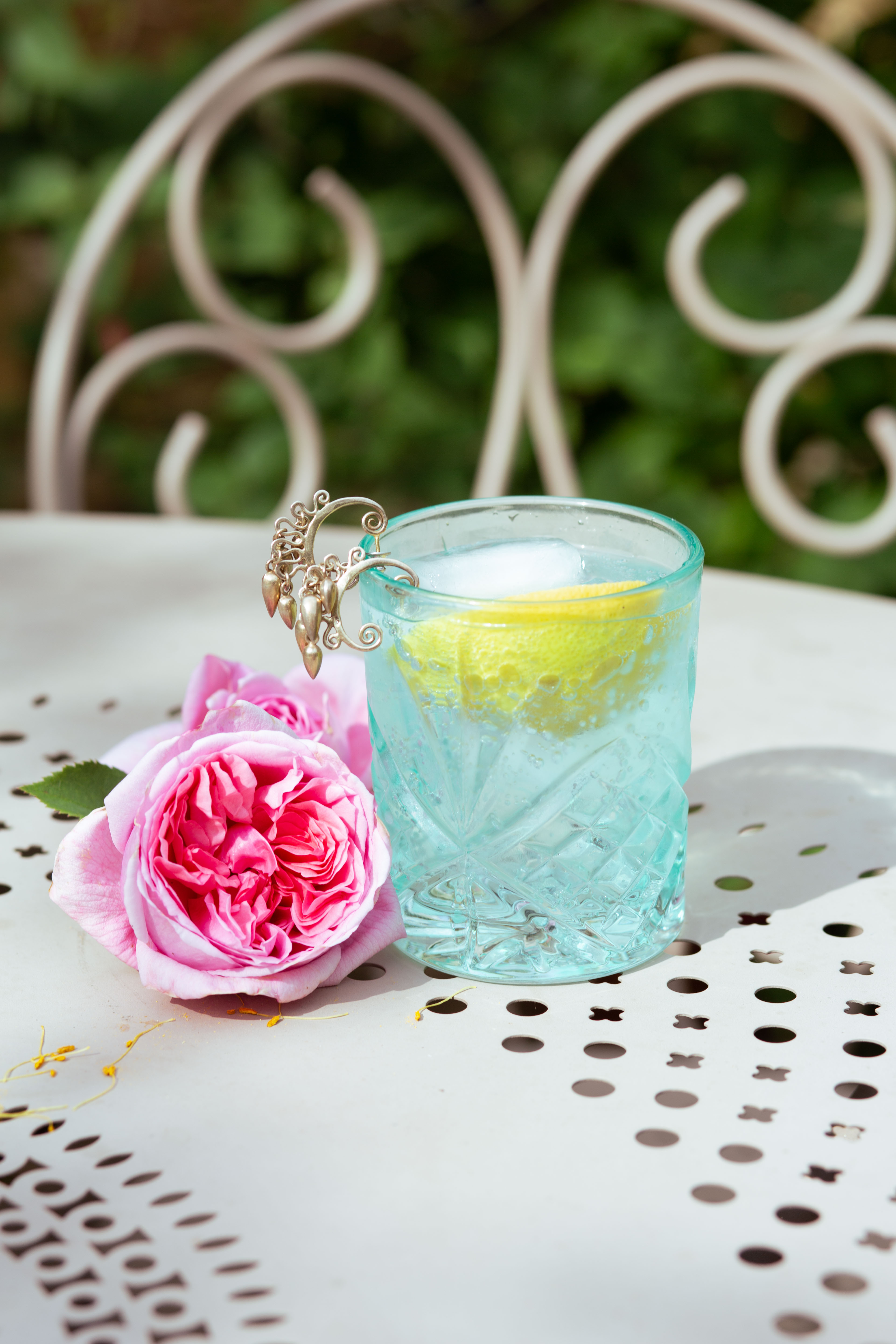 gin earrings and rose